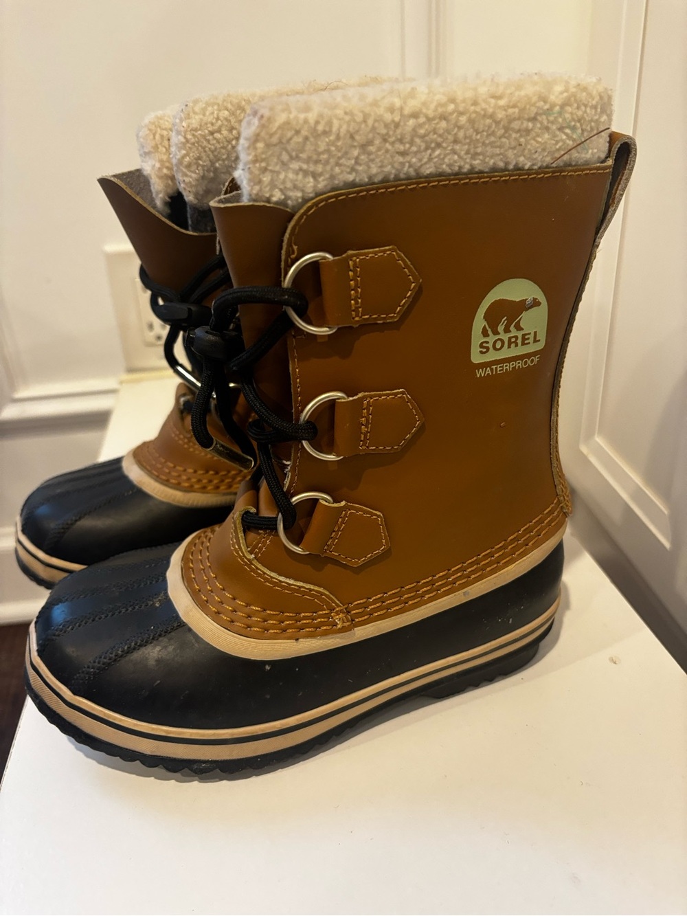 Sorel Kids Waterproof Lace-Up Boots in Brown and Black